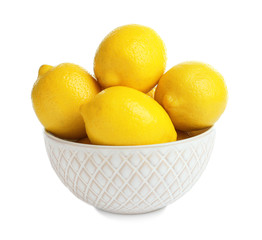 Bowl with ripe yellow lemons on white background