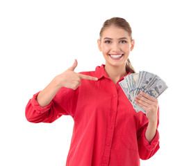 Beautiful young woman with dollar bills on white background