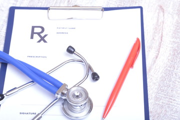 Closeup of medical stethoscope on a rx prescription