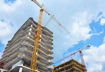 Crane and highrise construction site