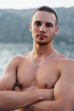 Portrait of topless muscular man