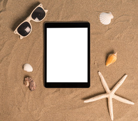 Tablet on the sand