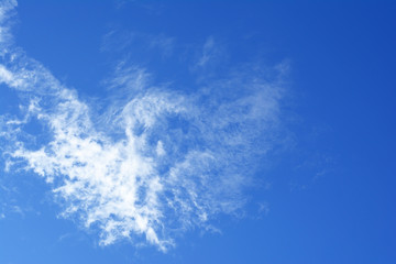 blue sky with white clouds and sun light