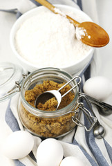 Flour, brown sugar and eggs for baking