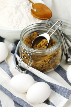 Flour, brown sugar and eggs for baking