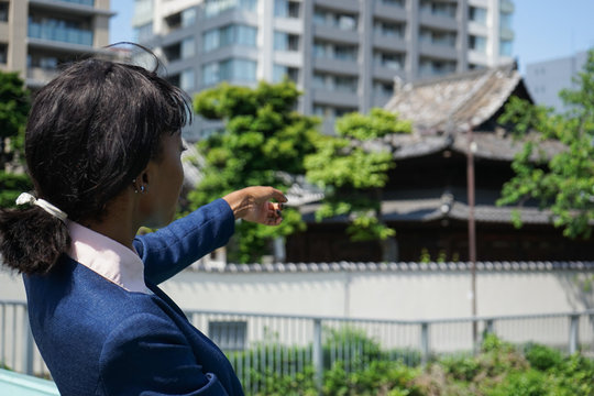 african woman doing sightseeing in Japan