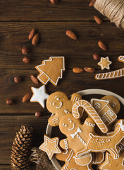 Ginger men on a wooden background. Gingerbread. Christmas cookies
