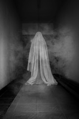 Girl in white costume for Halloween