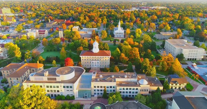 Sunrise flyover of beautiful Autumn colors in Appleton Wisconsin.
