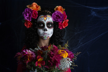 La Calavera Catrina little girl costume and makeup. Día de los Muertos celebration