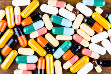 Drug prescription for treatment medication. Pharmaceutical medicament, cure in container for health. Pharmacy theme, capsule pills with medicine antibiotic in packages.closeup,Medicine or capsules.