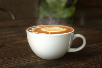 coffee cup on wooden table