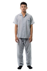 Handsome man in pajamas close up portrait studio on white background