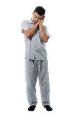Fototapeta premium Handsome man in pajamas close up portrait studio on white background