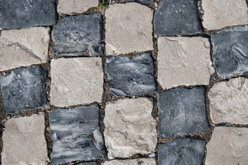 Black and White stone floor in Squares at sunny day