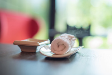 White towel for hands on a table in a sushi restaurant