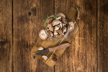 Fototapeta na wymiar Portion of Raw Shiitake mushrooms, selective focus