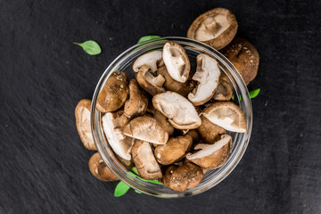 Portion of Raw Shiitake mushrooms, selective focus