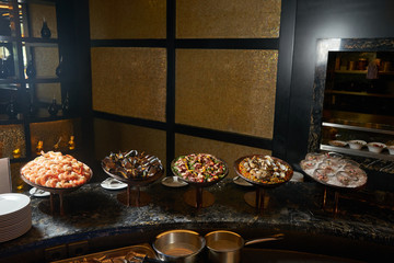 Set of seafood on kitchen countertop