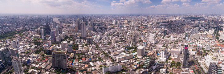Fototapeta na wymiar High Aerial Panorama Over Silom And Sathorn Districts In Bangkok, Thailand
