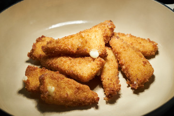 Fried chicken nuggets in cooking pan