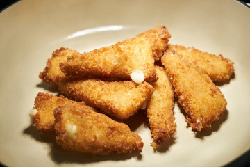 Fried chicken nuggets in cooking pan