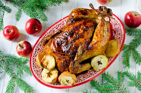 Traditional Christmas chicken, turkey baked with apples