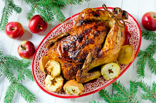 Traditional Christmas chicken, turkey baked with apples