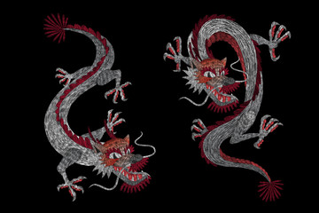 Set. a crane, a fire bird, a dragon and red roses. Traditional folk stylish stylish embroidery on the black background. Sketch for printing on clothing, fabric, bag, accessories and design. 