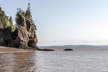 famous Hopewell Rocks geologigal formations at low tide biggest tidal wave Fundy Bay New Brunswick...
