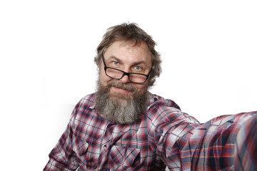 Obraz premium Portrait of an adult man with a beard on a white background