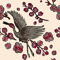 flowers cherry blossom and crane, east. traditional stylish fashionable embroidered embroidery on a black background. sketch for printing on fabric, bag, clothes, accessories and design. trend vector