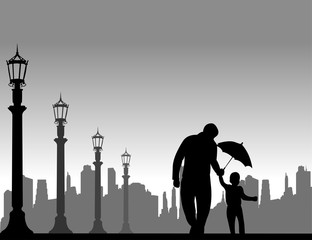 Father walking with his child on the street with umbrella, one in the series of similar images silhouette