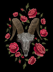 Skull of a goat or a cow and red roses. Traditional folk stylish stylish floral embroidery on the black background. Sketch for printing on fabric, clothing, bag, accessories and design. vector, trend