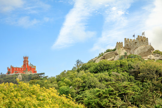 Sintra, Portugal. The original Pena Palace and the ruins of Moors Castle are two popular landmarks and major tourist attractions of the Cultural Landscape of Sintra as a World Heritage Site.