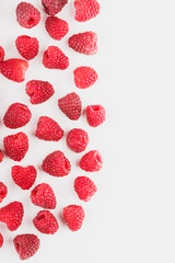Background from raspberries, isolated on white