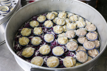 Steamed sweet potato  and taro cake, Khanom Puak & Kanom man for sell at Sriyan market, Bangkok, Thailand