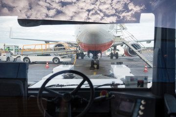 Airplane Seen Through Towing Truck