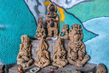 ancient maya statues in a praying room in Guatemala 