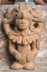 Fototapeta na wymiar religious statue closeup inside a Mayan praying room