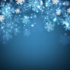Fototapeta na wymiar Blue winter background with snowflakes.