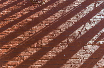 abstract line shadows on painted brick wall background texture