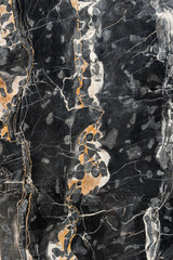 Dark natural slab of marble background texture