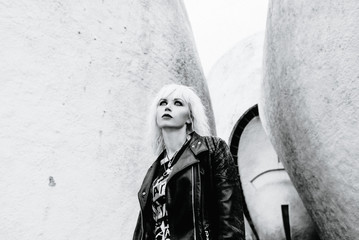 monochrome portrait of stylish blonde grunge young woman 