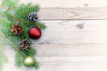 Christmas background with decorations on wooden board