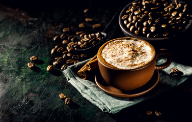 Obraz na płótnie Canvas Cup of delicious cappuccino in arrangement