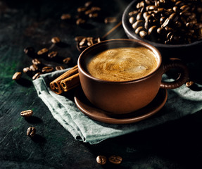 Steaming fresh coffee in cup