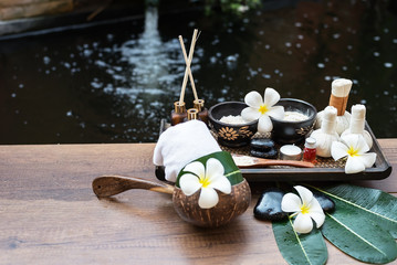 Spa massage compress balls, herbal ball on the wooden with treaments spa , Thailand, select focus.