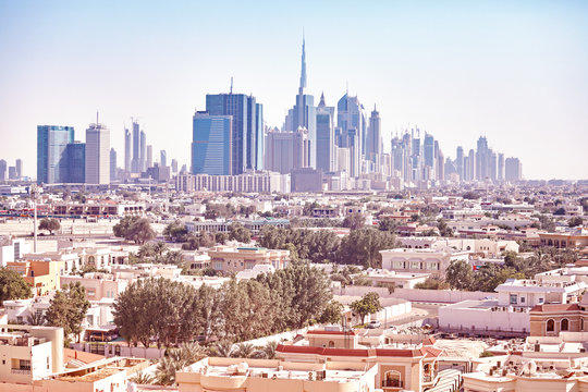 Color toned picture of Dubai skyline, United Arab Emirates.