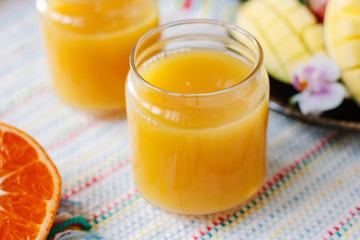 Mango and orange detox juice made from fresh fruits.